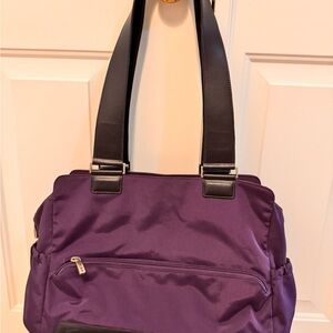 TUMI.  Vintage. Purple double leather straps shoulder bag.